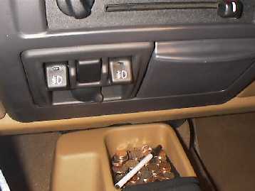 The dual switches for the fog lights and Hellas.