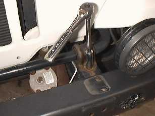 Remove front bolts holding down the anti-sway bar.