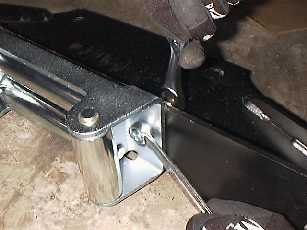 Mount the roller fairlead to the winch plate.