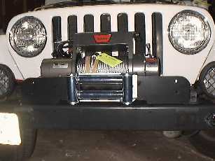 Test fit the plate and winch to the Jeep.