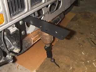 Install the upper winch mount brackets.